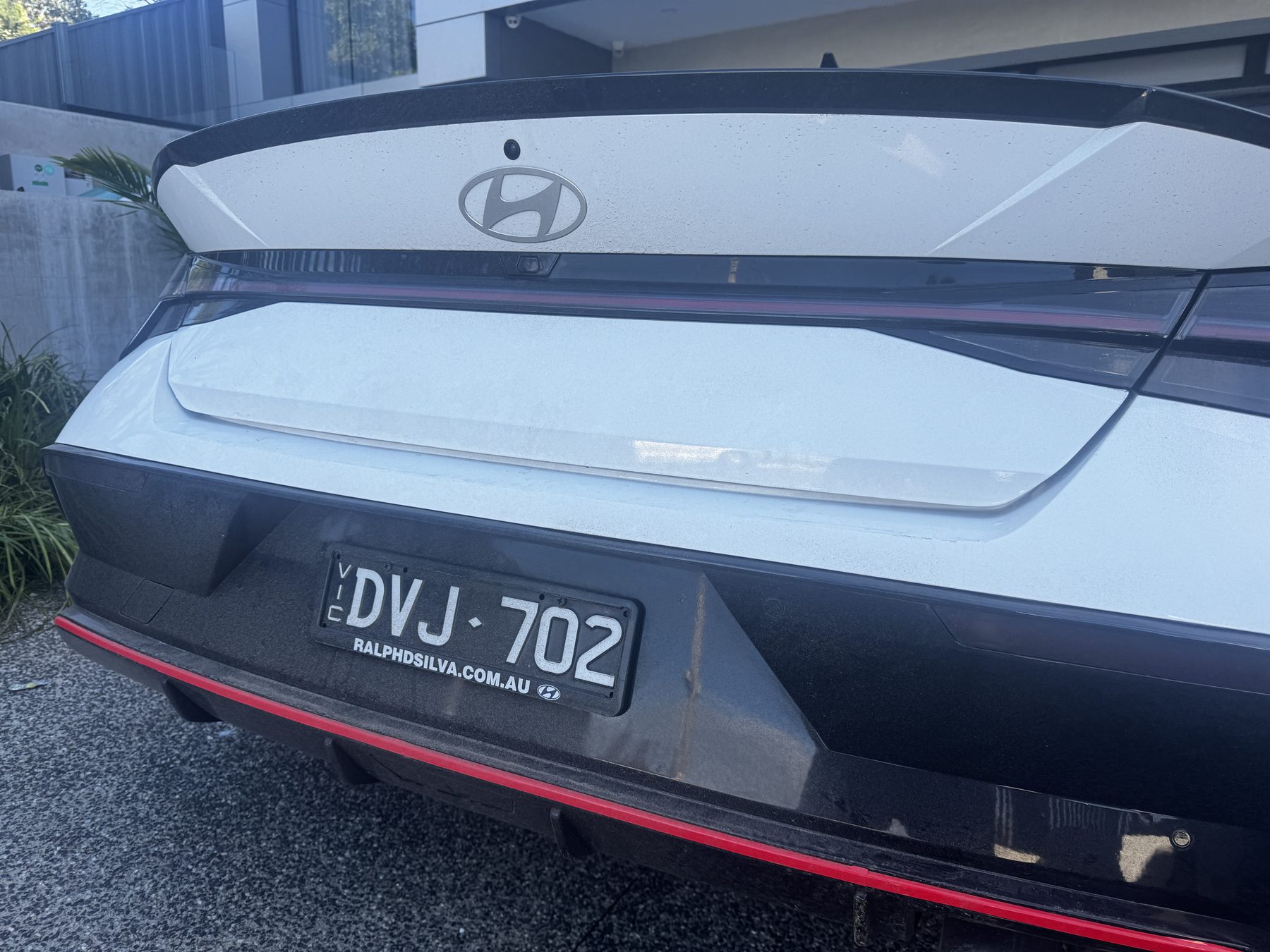 Rear bumper & panel detail — before